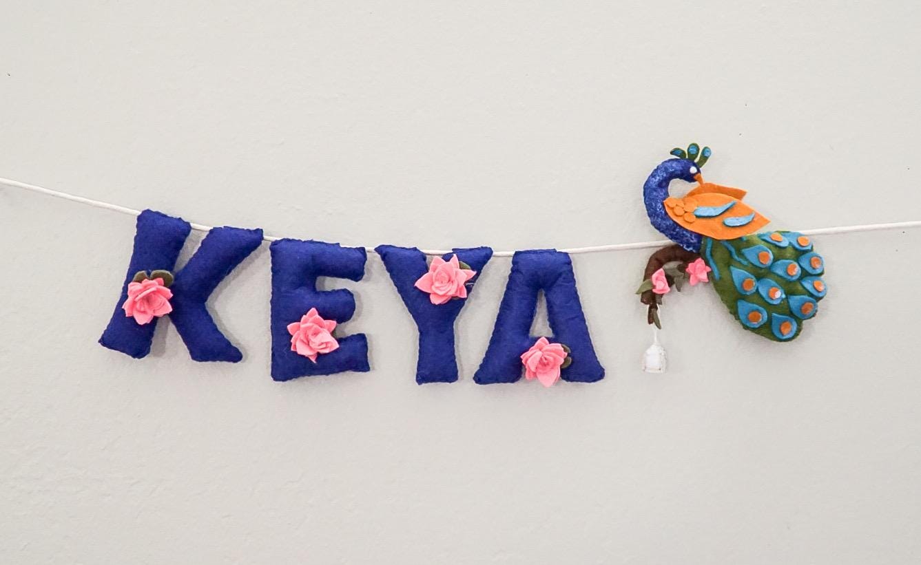 Personalized Felt Name Banner: Peacock & Lotus Nursery Decor